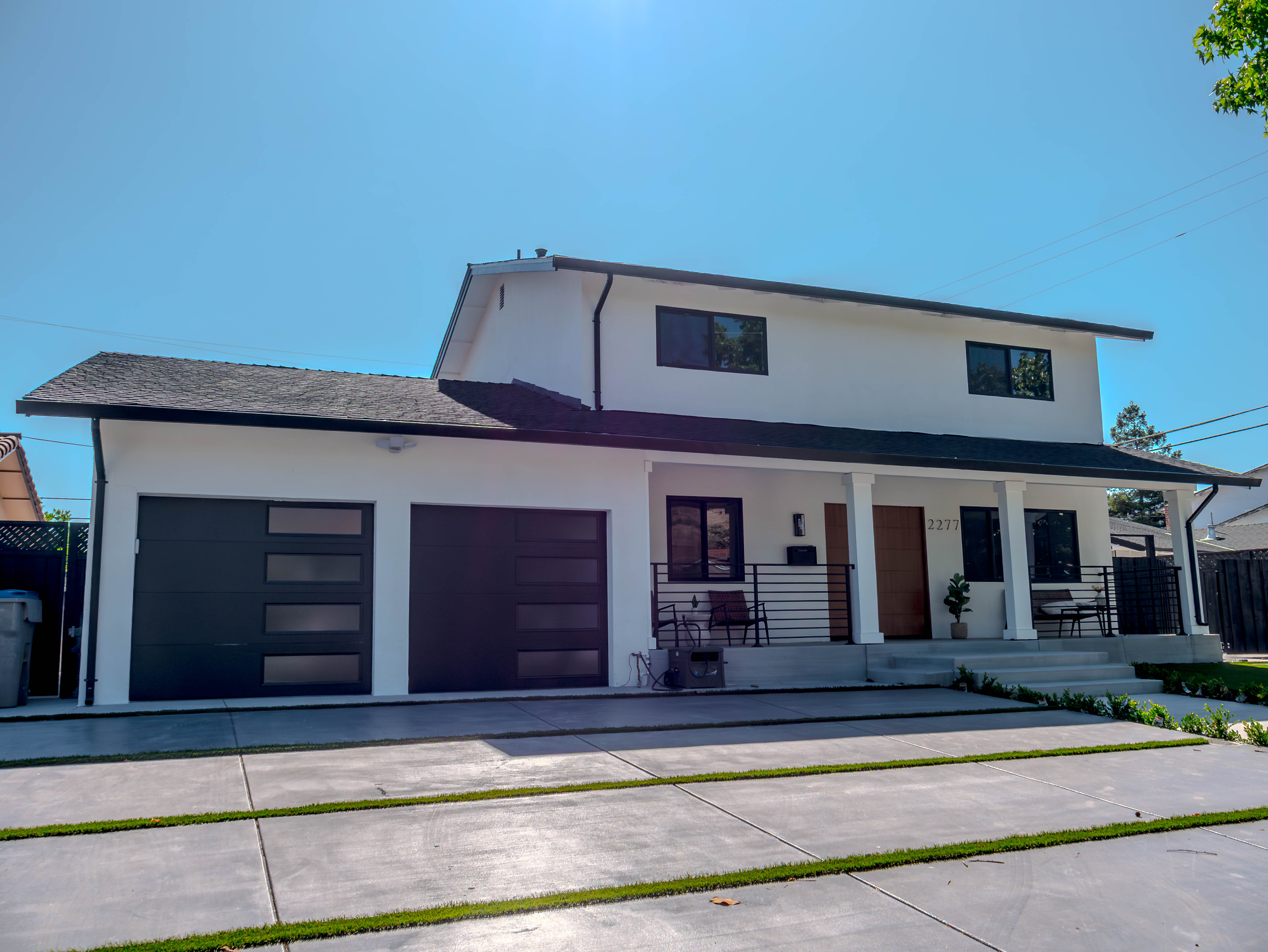Complete exterior view showing modern garage design and architectural details