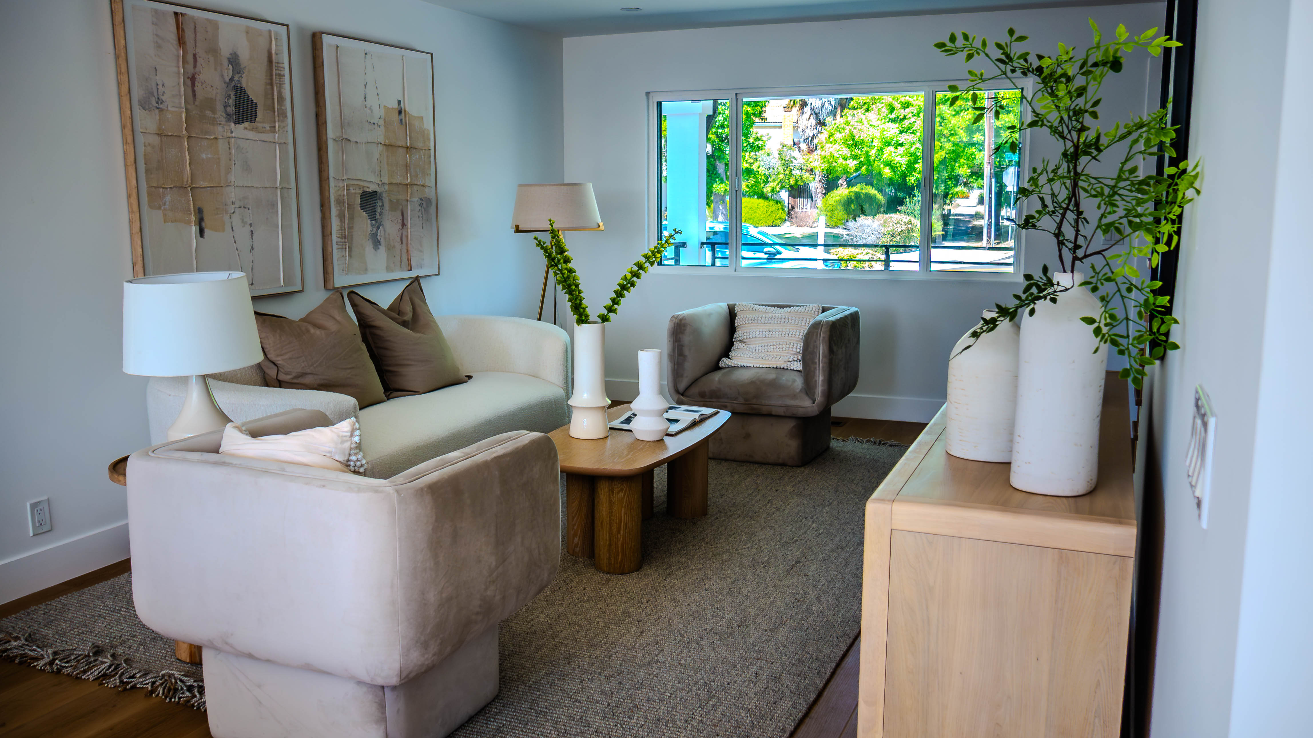 Living room alternative view showing sophisticated interior design with natural materials and thoughtful styling