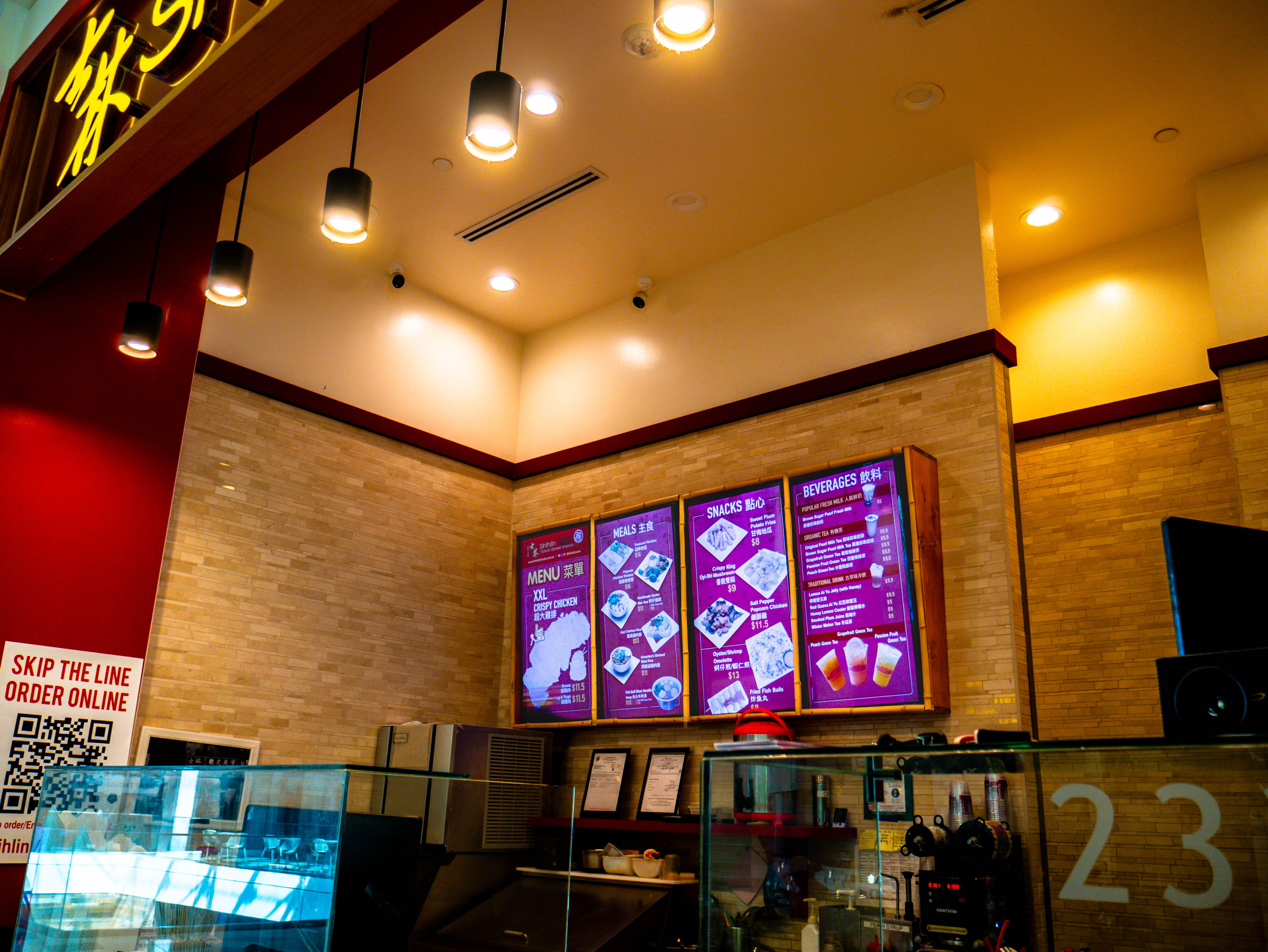 Complete interior service area showing counter design, equipment placement, and customer flow optimization