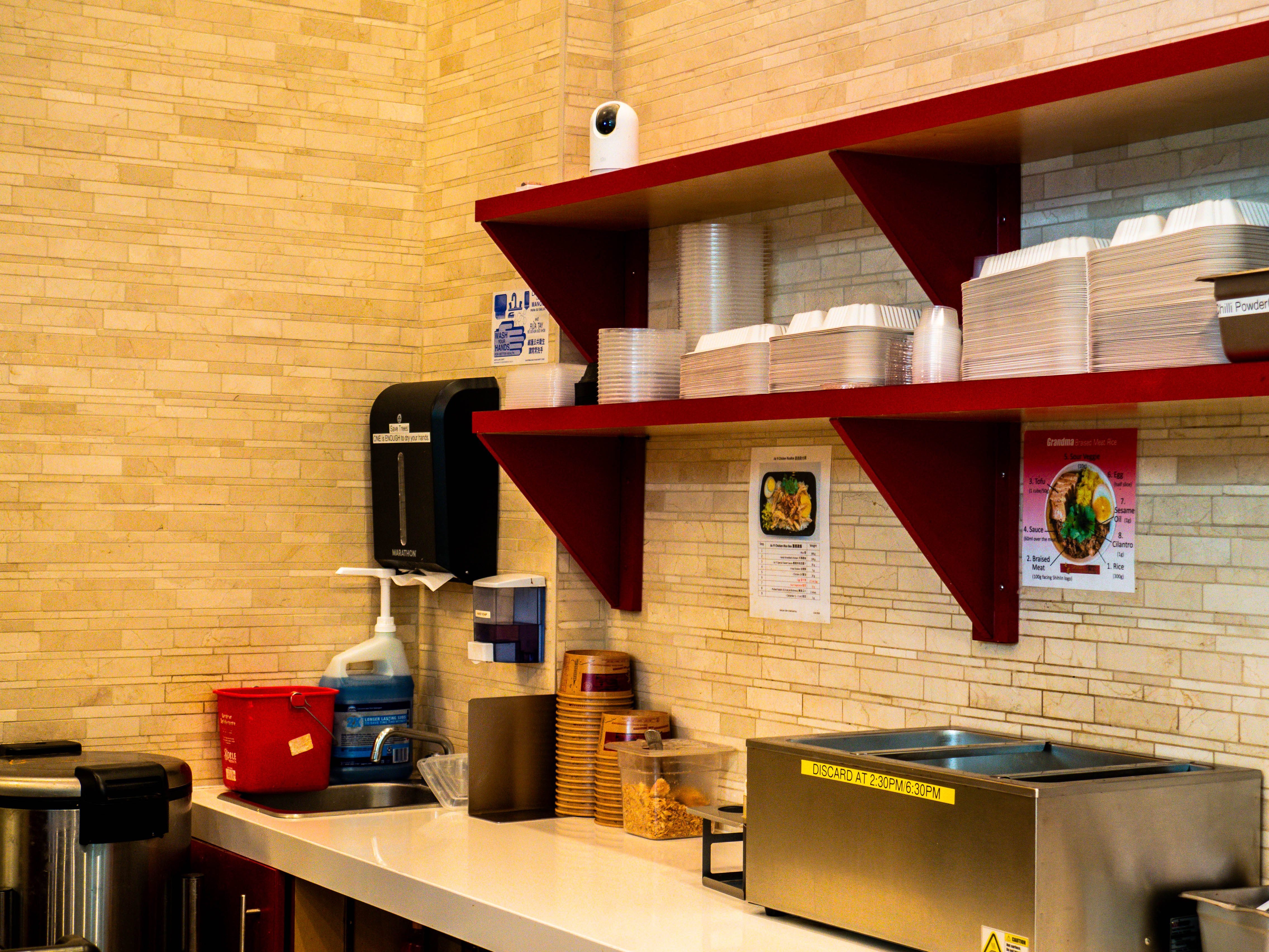 Professional storage shelving system with organized ingredient storage and efficient kitchen workflow